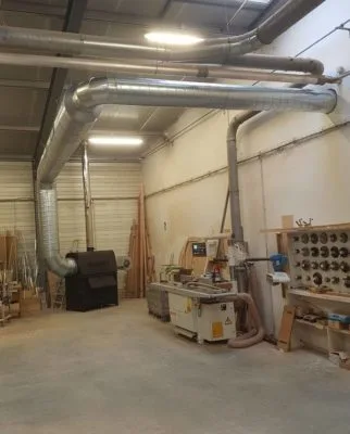 wood burning heater connected to a duct work system Flexiheat UK